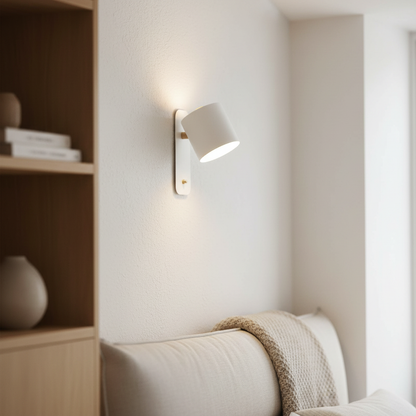 Cilindro Rotating Wall Lamp in a reading corner