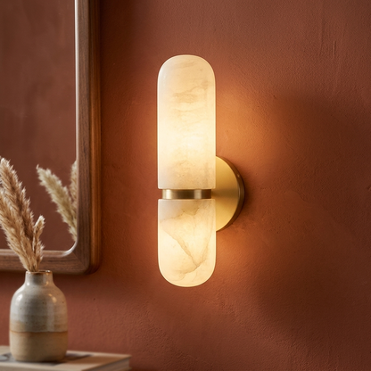 Alabaster wall sconce on a warm, contrasting interior wall
